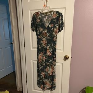 Gently wore floral romper. Junior medium.